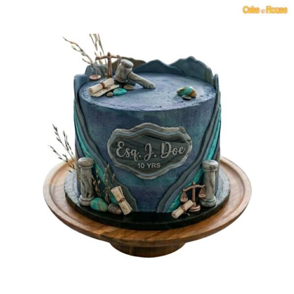 Esq. J. Doe legal career anniversary cake with gavel, justice scale, scrolls, stone-effect icing and personalised plaque