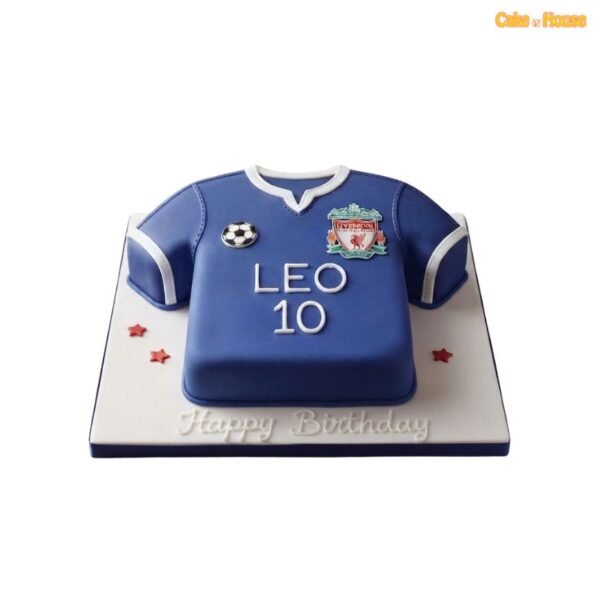 Blue Liverpool football shirt-shaped birthday cake with white trim, club crest, football badge, red stars and personalised details