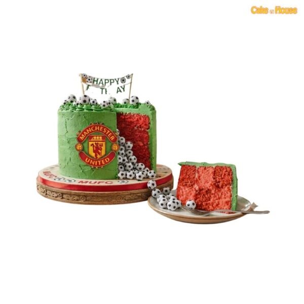 Green Manchester United football birthday cake with textured icing, club crest, miniature football cascade, birthday banner and exposed red sponge