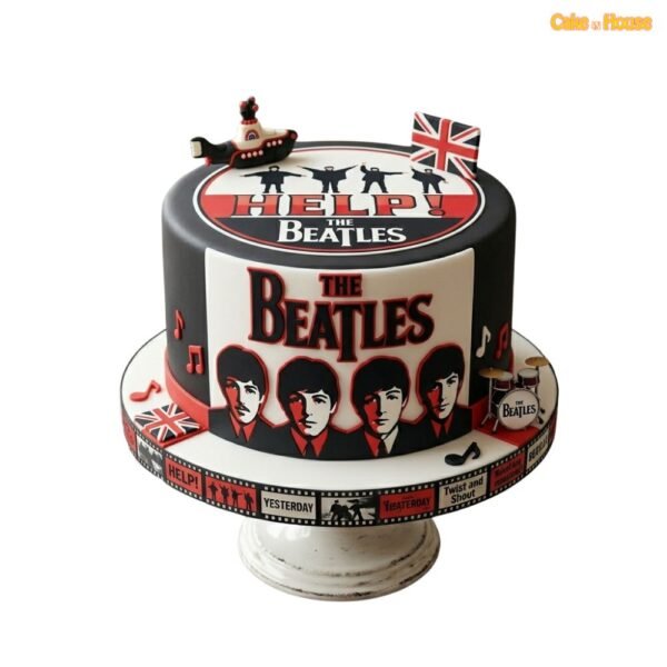 Beatles Help album birthday cake with black and red design, Beatles portrait artwork, Union Jack flags, drum set and music notes