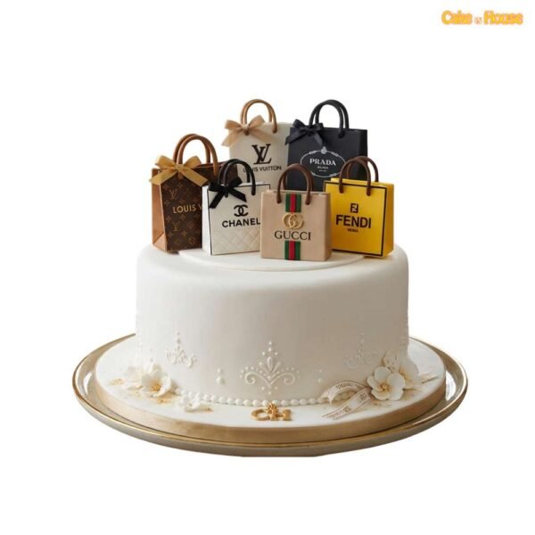 Luxury designer shopping bags cake with Louis Vuitton, Chanel, Gucci, Prada and Fendi inspired toppers, white icing and gold accents